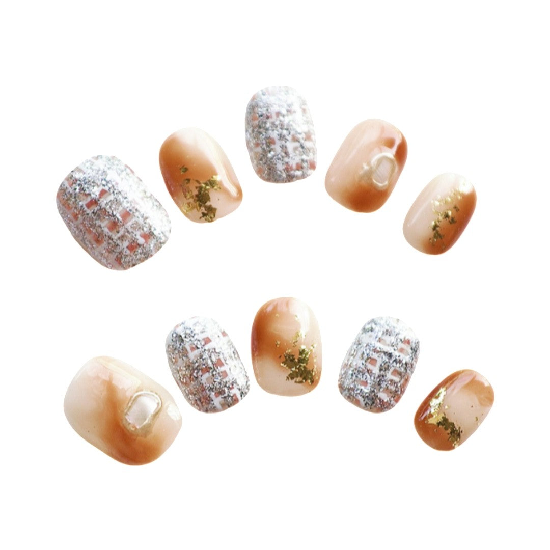 GlamGold Tweed Chic press on nails, combing luxe metallic tweed accents with soft ombré tones