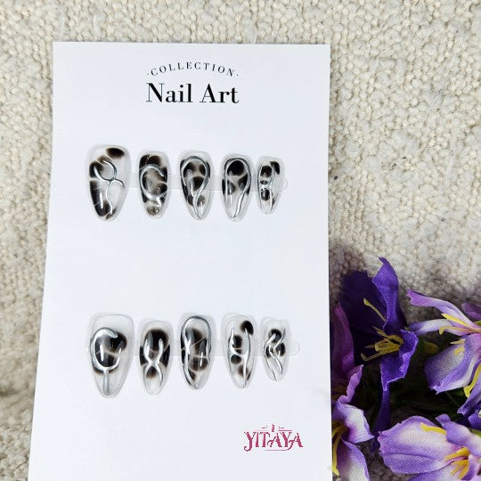 Midnight Mirage Handmade Gel Nails, glossy black base with intricate metallic silver accents