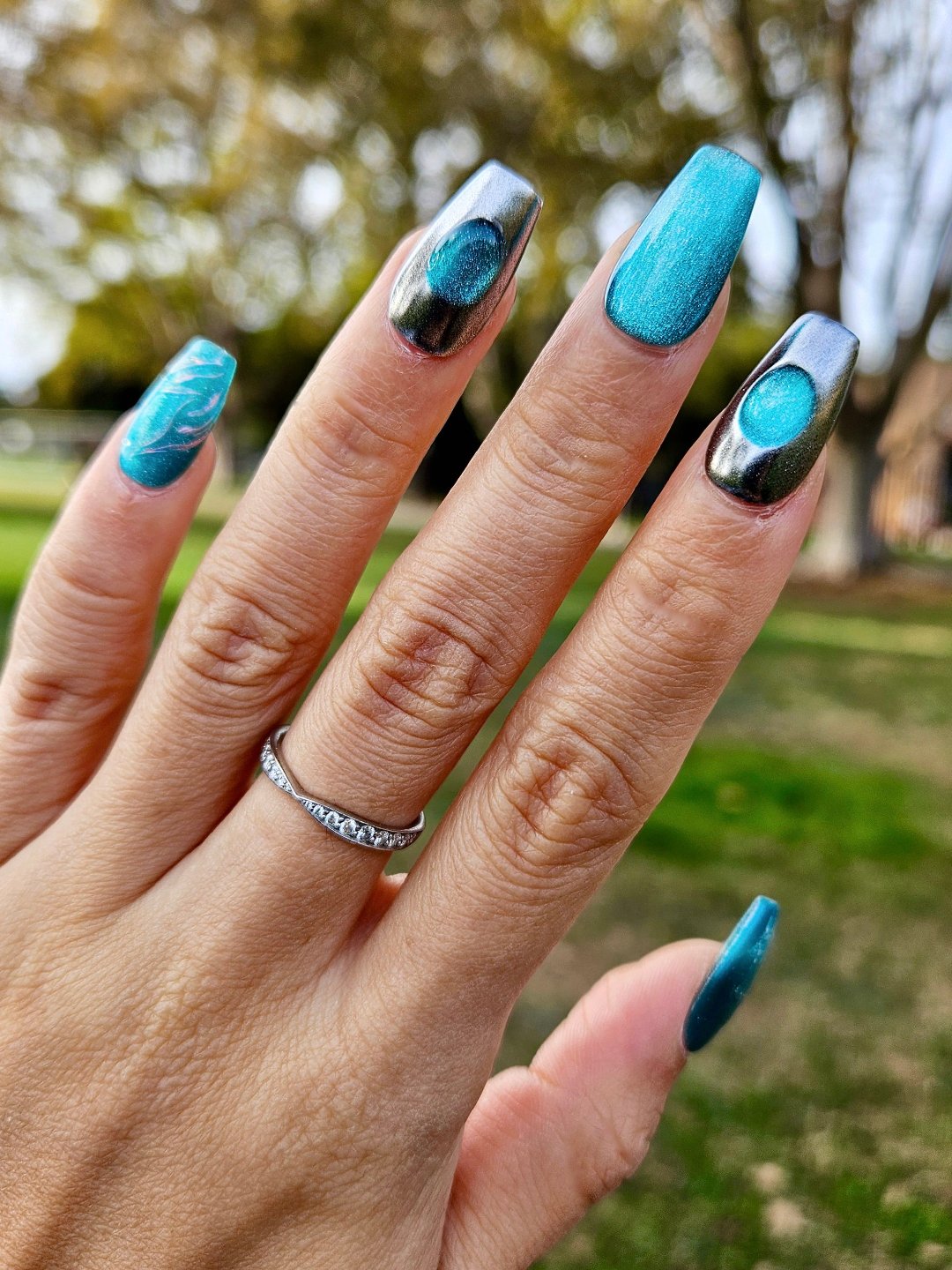 Ocean Aura handmade press on Nails, with stunning aqua and metallic accents