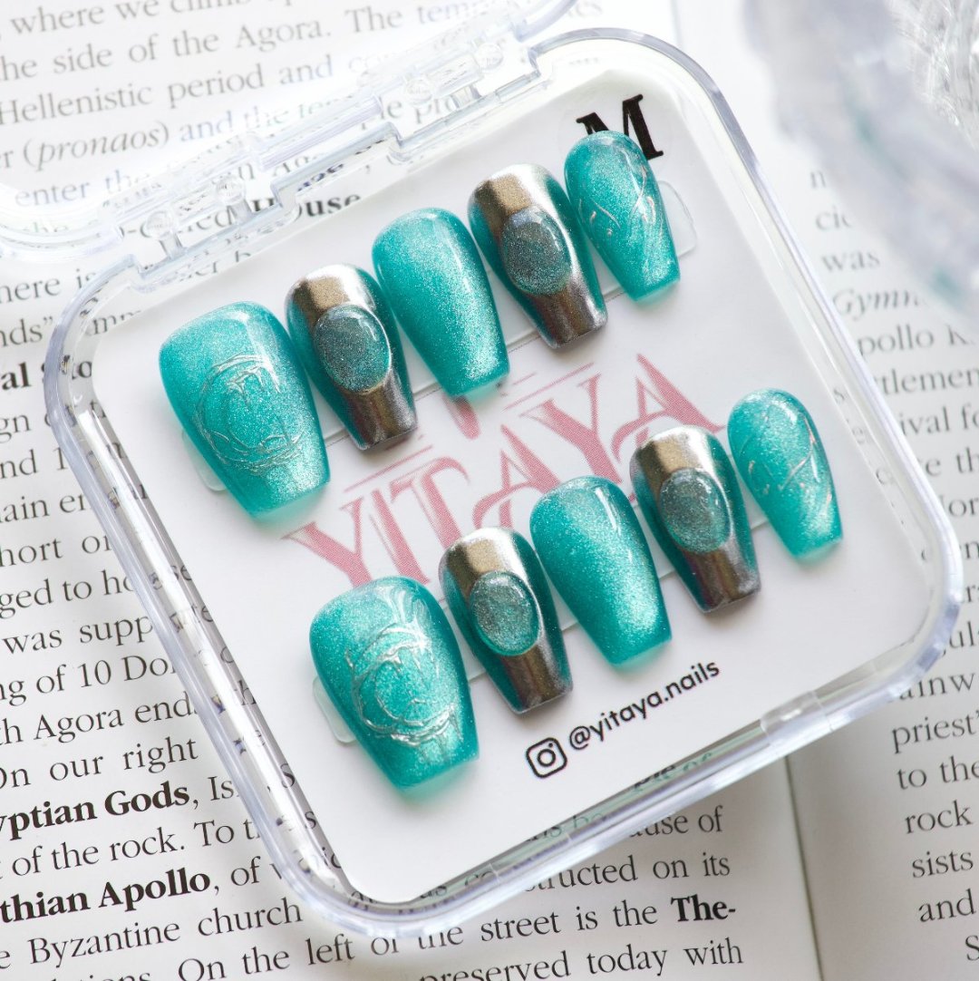 Ocean Aura handmade press on Nails, with stunning aqua and metallic accents