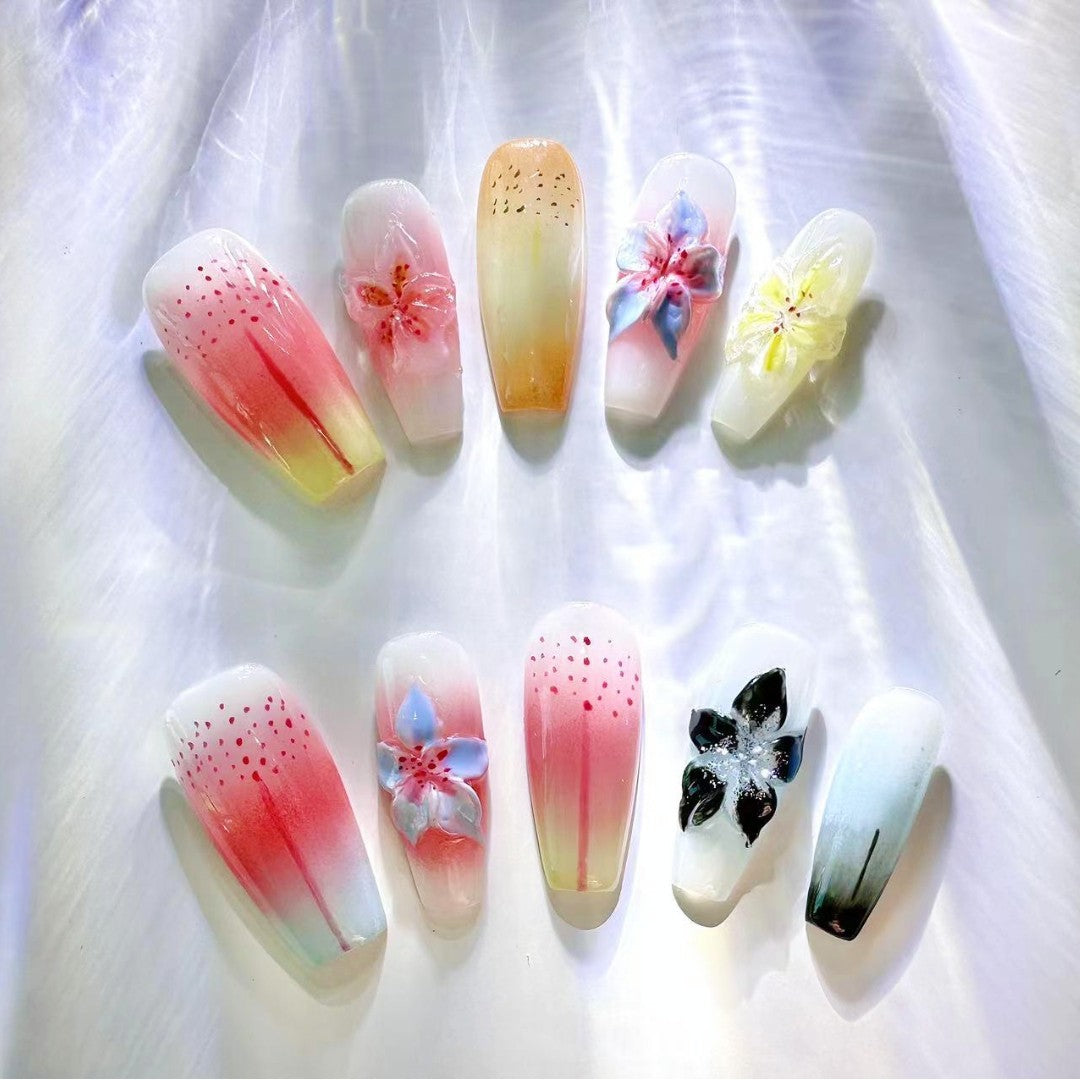 3D Accents Press-On Nails from Yitaya, in pink yellow and white.