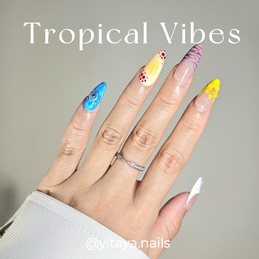 Handmade press on nails featuring vibrant colors, 3D pearl shell and floral designs, and a salon-quality finish.