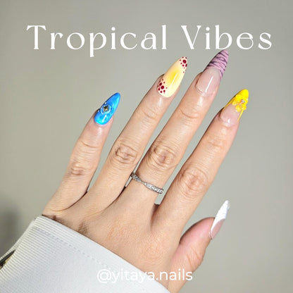Handmade press on nails featuring vibrant colors, 3D pearl shell and floral designs, and a salon-quality finish.