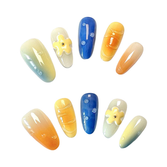Summer Vibes Press-On Nails from Yitaya -- capturing the essence of summer with  a beautiful gradient of blue and orange colors, reminiscent of the ocean and the setting sun