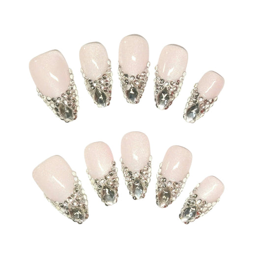 Crystal Lace Elegance nails from Yitaya, featuring a nude pink base with shimmering crystal designs 