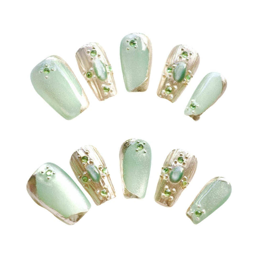 Emerald Dream Luxe press on nails, featuring a dreamy blend of soft sage green and shimmering metallic accents