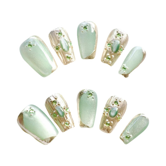 Emerald Dream Luxe press on nails, featuring a dreamy blend of soft sage green and shimmering metallic accents