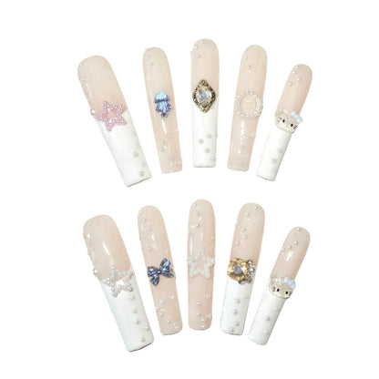 Ethereal Pearl Adornments Press On Nails, with a delicate blend of soft nude tones and creamy whites