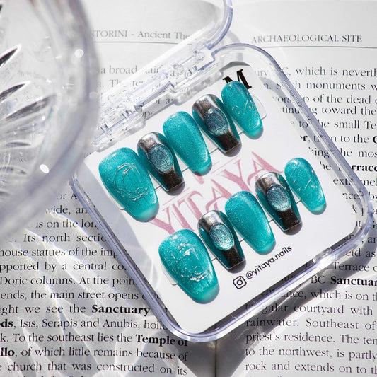 Ocean Aura handmade press on Nails, with stunning aqua and metallic accents