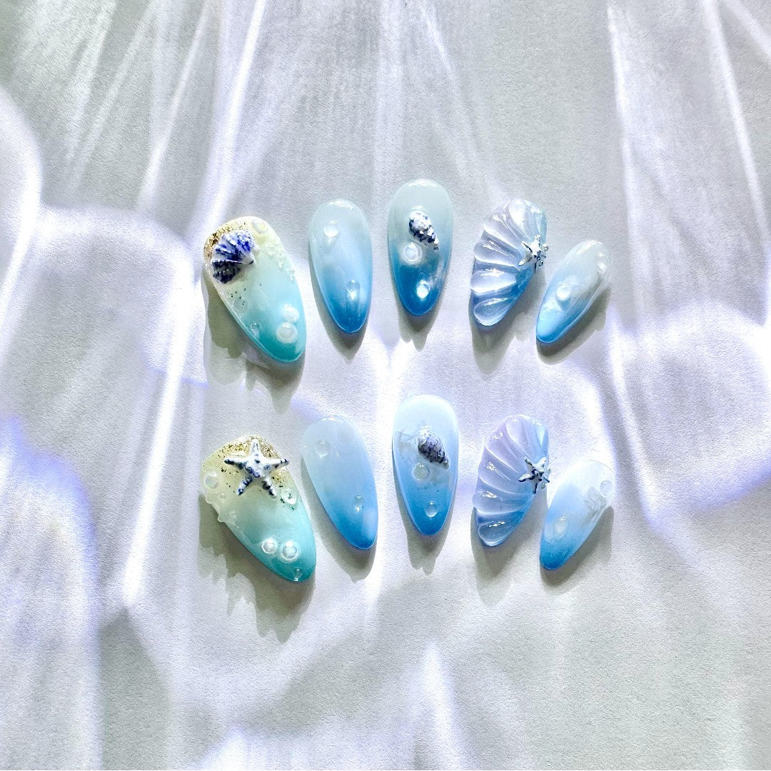 Ocean Breeze Fantasy Gel Nails from Yitaya, inspired by ocean waves and sandy shores