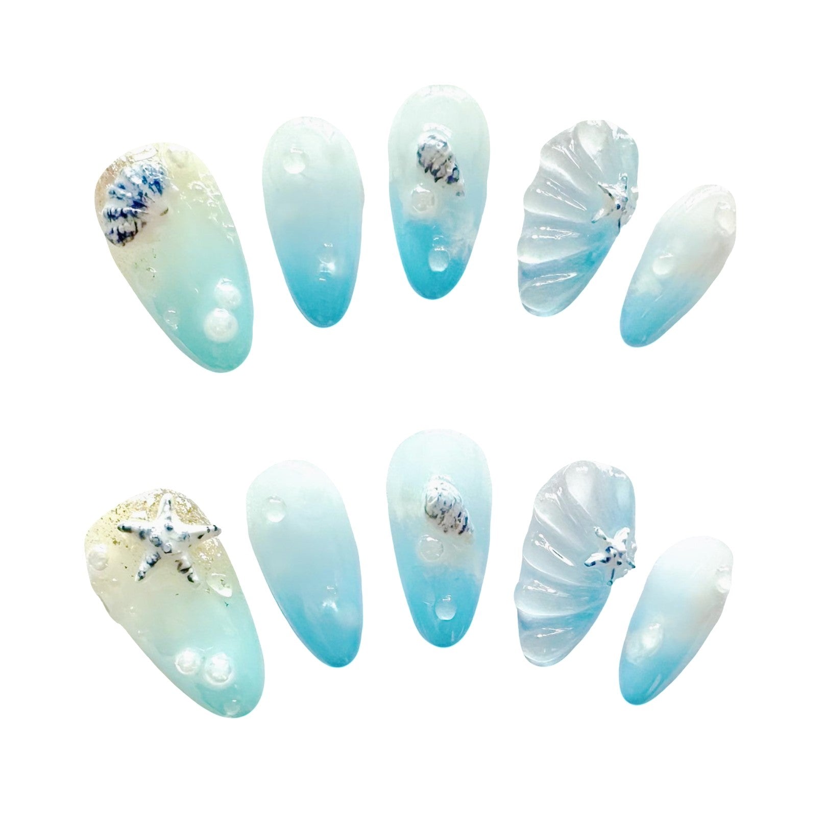 Ocean Breeze Fantasy Press On Nails from Yitaya, inspired by ocean waves and sandy shores