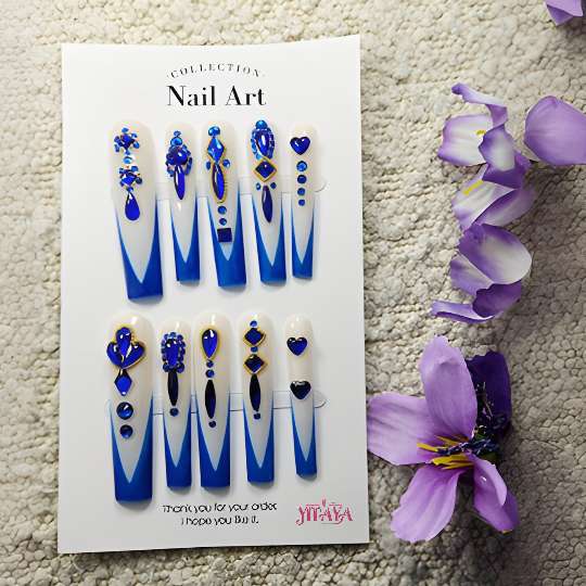 Sapphire Royalty Press-On Nails, featuring a striking gradient from elegant ivory to deep sapphire blue