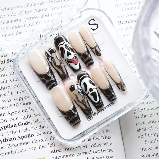 Scream Queens Press On Nails, showcasing the iconic Scream mask alongside edgy black and silver glitter designs