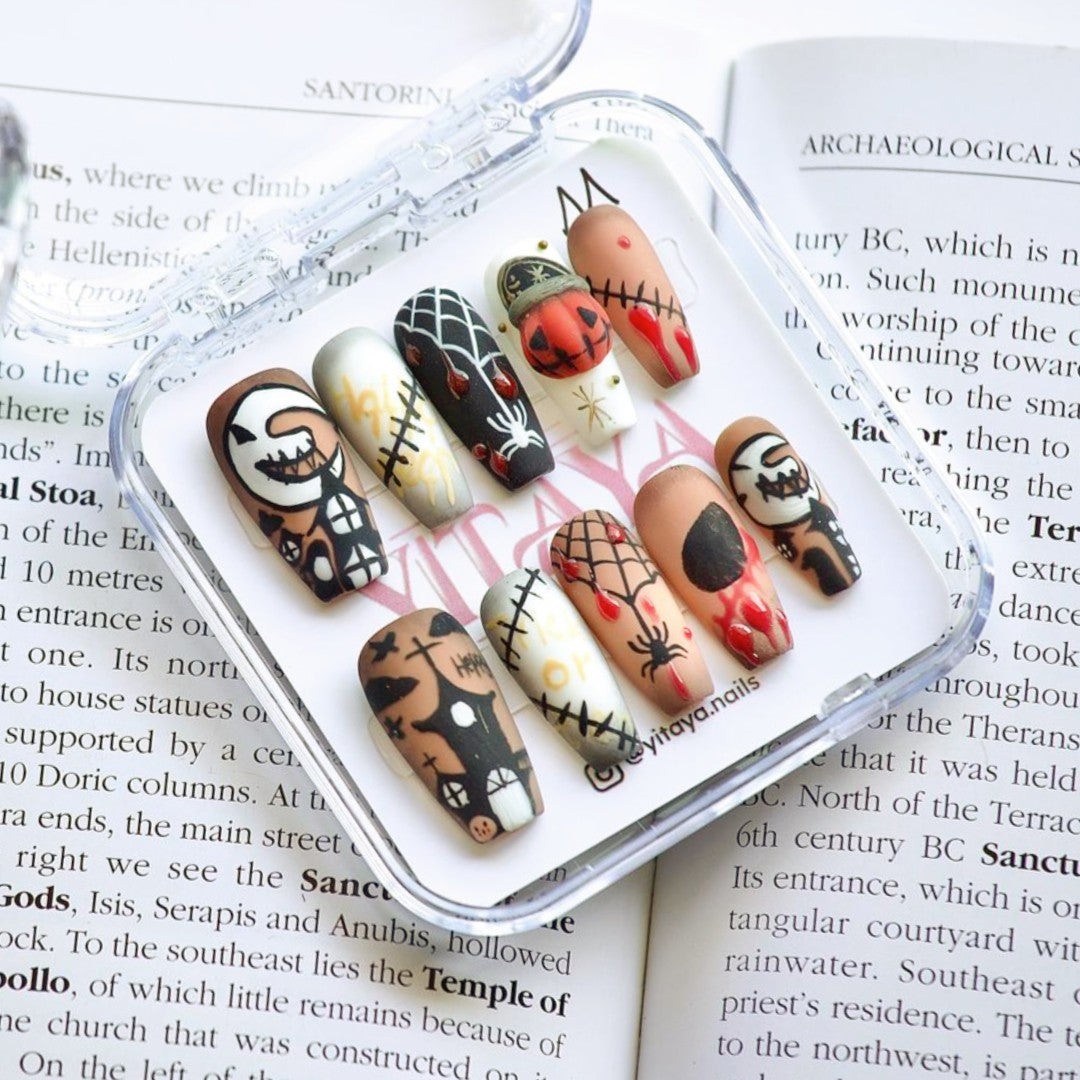 Spooky Stitch, a set of press on nails perfect for Halloween enthusiasts